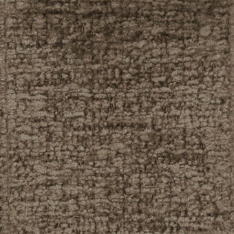 Brown looped pile fabric texture with nubby surface, displaying “turri > fabric cat. b > 778 b” label, warm neutral tones.